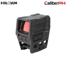 Holosun AEMS-CORE-120101 enclosed green dot sight with 2 MOA reticle and a black anodized finish on a rifle.